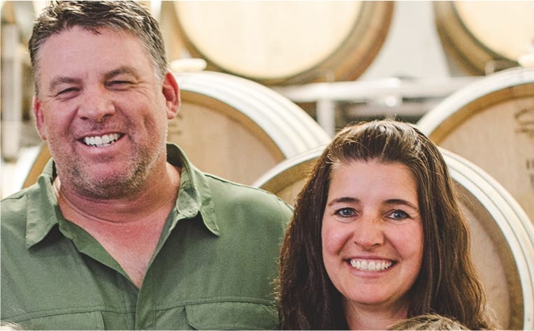 a man and a woman smiling